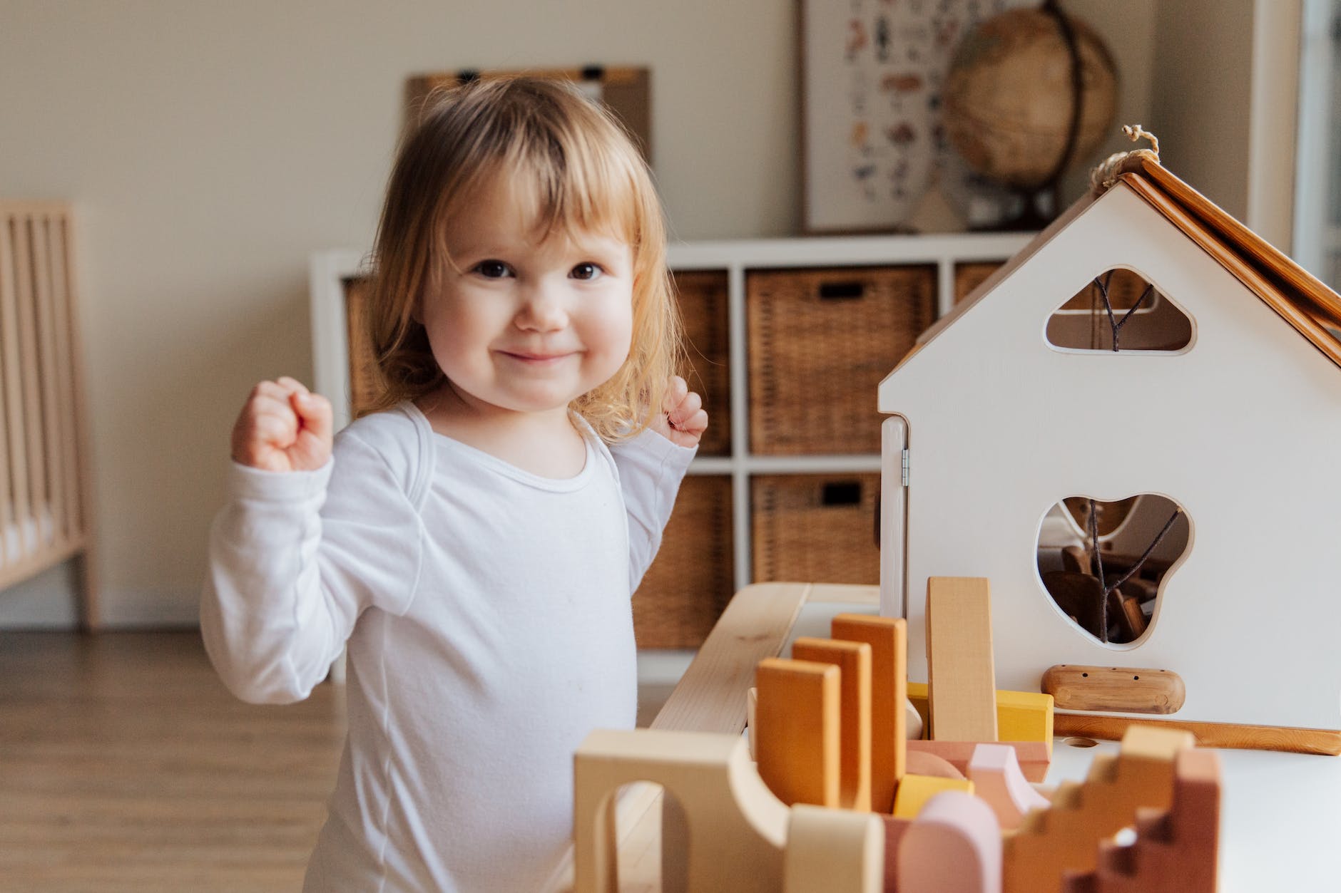 girl playing inside her room